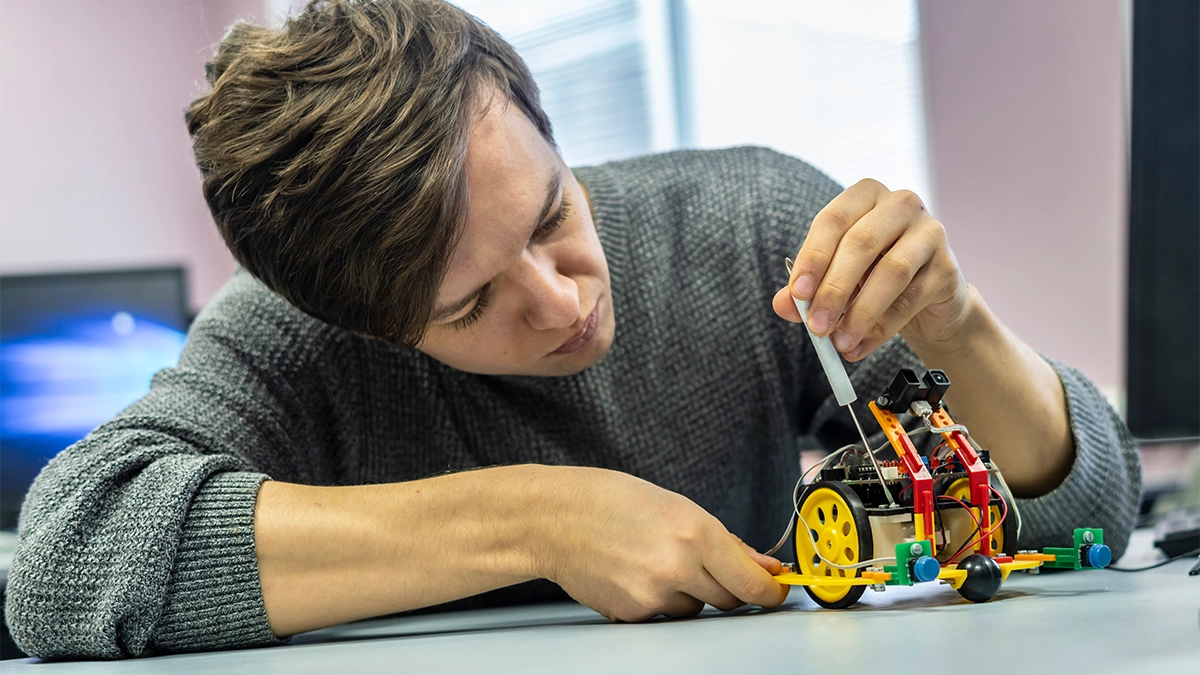 Man builds robot to test code project